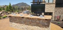 outdoor kitchen with tv